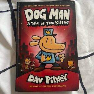 Dog Man: A Tale of Two Kitties by - Red and Black Cover